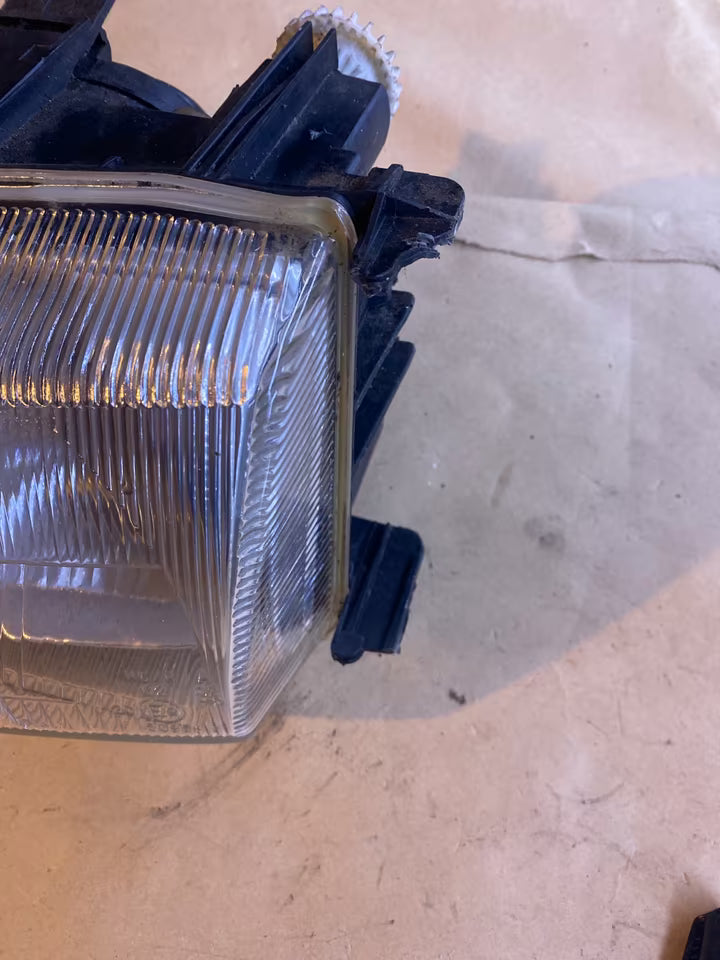 VW Caddy Scheinwerfer links 085818