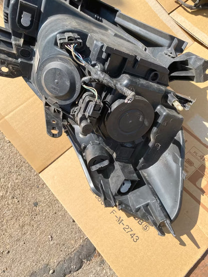 Renault Clio III Frontscheinwerfer links