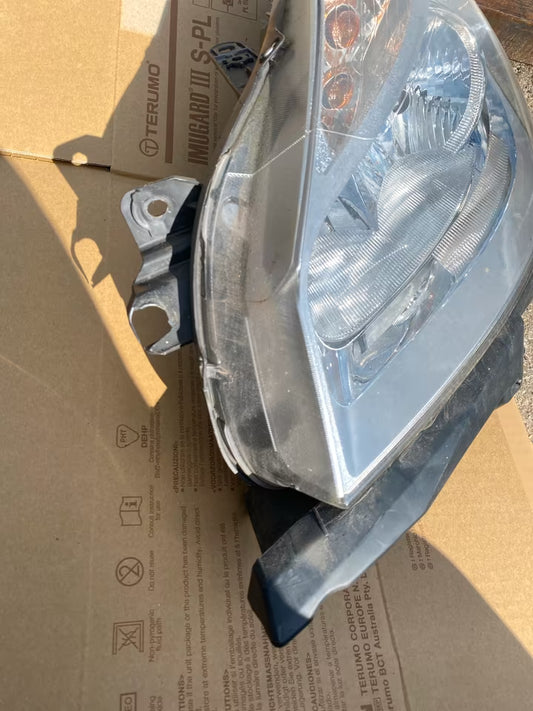 Renault Clio III Frontscheinwerfer links