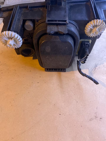 VW Caddy Scheinwerfer links 085818