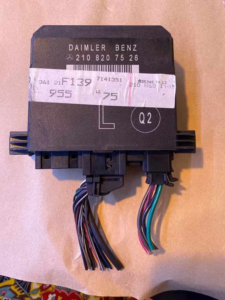 Mercedes W210 Türsteuergerät links 2108207526