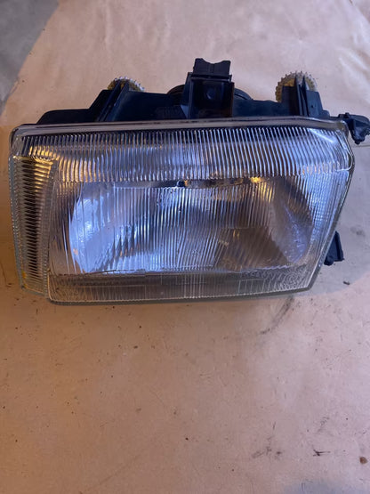 VW Caddy Scheinwerfer links 085818
