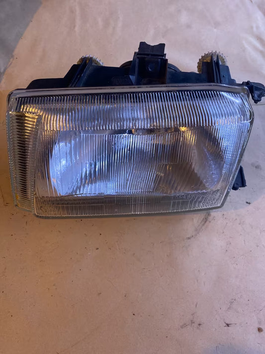 VW Caddy Scheinwerfer links 085818